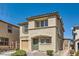 Charming two-story home featuring a well-maintained yard, neutral exterior, and attached garage at 1129 Paradise Vista Dr, Henderson, NV 89002