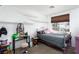 This bedroom offers natural light with white shelves and space for a vanity desk and stool at 1142 Teal Point Dr, Henderson, NV 89074