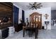 Inviting dining room featuring modern wood furniture, elegant decor and natural light at 1142 Teal Point Dr, Henderson, NV 89074