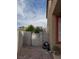 Fenced backyard with a rock ground cover at 1286 N Sloan Ln, Las Vegas, NV 89110