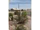 A fully fenced-in backyard with low-maintenance desert landscaping and ample space for recreation at 1286 N Sloan Ln, Las Vegas, NV 89110