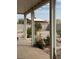 Covered patio features tile flooring and access to a spacious backyard, perfect for outdoor entertaining at 1286 N Sloan Ln, Las Vegas, NV 89110