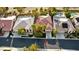 Aerial view of a home in a neighborhood with mature landscaping and manicured lawns at 129 Chateau Whistler Ct, Las Vegas, NV 89148