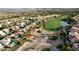 Aerial view of a home backing onto a golf course, surrounded by desert landscaping at 129 Chateau Whistler Ct, Las Vegas, NV 89148