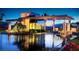 Luxurious gated community entrance featuring modern architecture, elegant design, and tranquil water features at 129 Chateau Whistler Ct, Las Vegas, NV 89148