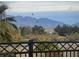 Expansive mountain view from the property featuring lush vegetation and beautiful birds at 129 Chateau Whistler Ct, Las Vegas, NV 89148