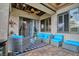 Comfortable outdoor patio seating area with a ceiling fan for added comfort at 129 Chateau Whistler Ct, Las Vegas, NV 89148