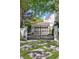 Elegant gated driveway with a beautifully designed entrance, showcasing the property's curb appeal and security features at 1309 Reisling Ct, Las Vegas, NV 89144