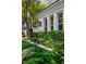 Well-manicured lawn and shrubbery define the entrance to this home at 1309 Reisling Ct, Las Vegas, NV 89144