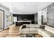 Spacious living room with modern decor, flowing into the gourmet kitchen area at 1309 Reisling Ct, Las Vegas, NV 89144