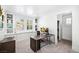 Bright home office with built-in cabinetry and a large desk area for productivity at 1309 Reisling Ct, Las Vegas, NV 89144
