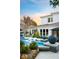 The backyard with a serene pool featuring in-pool lounge chairs and elegant landscaping offers relaxation and beauty at 1309 Reisling Ct, Las Vegas, NV 89144