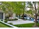 Beautiful backyard featuring a pool, lush green lawn, patio, and landscaped areas at 1309 Reisling Ct, Las Vegas, NV 89144