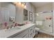 Bright bathroom featuring a large vanity and glass enclosed shower at 1372 Couperin Dr, Henderson, NV 89052