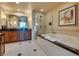 Luxurious bathroom with soaking tub, separate shower, and spacious vanity area at 145 E Harmon Ave # 3101, Las Vegas, NV 89109