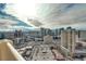 Expansive city view with various buildings and parking space, reflecting a lively atmosphere and urban landscape at 145 E Harmon Ave # 3101, Las Vegas, NV 89109