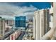 Stunning city view from a balcony, showcasing modern architecture and vibrant surroundings at 145 E Harmon Ave # 3101, Las Vegas, NV 89109