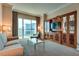 Inviting living room filled with natural light, entertainment center, and comfortable furnishings at 145 E Harmon Ave # 3101, Las Vegas, NV 89109