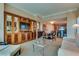 Spacious living room with stylish furniture, entertainment center, and dining area at 145 E Harmon Ave # 3101, Las Vegas, NV 89109