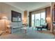 Bright living room boasting expansive windows with city views and comfortable seating at 145 E Harmon Ave # 3101, Las Vegas, NV 89109