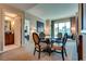 Comfortable living space with table, chairs and large windows, next to bedroom and bathroom at 145 E Harmon Ave # 3101, Las Vegas, NV 89109