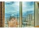 Stunning panoramic view from a large window captures the vibrant cityscape and distant horizons at 145 E Harmon Ave # 3101, Las Vegas, NV 89109