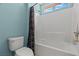 Well-maintained bathroom featuring a tub and shower combination with white tile surround at 1776 Gentle Brook St, North Las Vegas, NV 89084