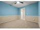 Comfortable bedroom featuring carpet flooring, a ceiling fan, and a serene atmosphere at 1776 Gentle Brook St, North Las Vegas, NV 89084