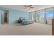 Airy main bedroom with a ceiling fan and lots of natural light at 1776 Gentle Brook St, North Las Vegas, NV 89084