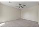 Empty bedroom with carpet, ceiling fan, and neutral walls providing a blank canvas at 1776 Gentle Brook St, North Las Vegas, NV 89084