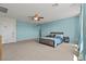 Expansive primary bedroom with ceiling fan and natural light from large window at 1776 Gentle Brook St, North Las Vegas, NV 89084