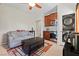 This combined living space has a compact kitchen, washer/dryer, and sitting area, great for a small household at 1776 Gentle Brook St, North Las Vegas, NV 89084