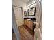 Well-lit bathroom featuring a granite vanity and tile flooring at 1830 N Buffalo Dr # 2098, Las Vegas, NV 89128