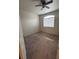 Neutral bedroom with a ceiling fan, carpet, and window with blinds at 1830 N Buffalo Dr # 2098, Las Vegas, NV 89128