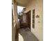 Condo front entrance featuring security door and visible unit number and door at 1830 N Buffalo Dr # 2098, Las Vegas, NV 89128