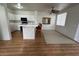 Bright kitchen area with white cabinets, island seating, and an open layout at 1830 N Buffalo Dr # 2098, Las Vegas, NV 89128