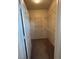 Walk-in closet featuring metal shelving and a neutral color scheme at 1830 N Buffalo Dr # 2098, Las Vegas, NV 89128