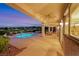 Expansive backyard patio with a pool is an entertainer's dream, offering outdoor living space and stunning city views at 1960 Oliver Springs St, Henderson, NV 89052