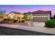 Desirable single-story residence featuring a manicured lawn, elegant landscaping, and a peaceful neighborhood atmosphere at 1960 Oliver Springs St, Henderson, NV 89052