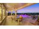 Inviting covered patio features a spa, seating, and scenic views, perfect for outdoor entertaining at 1960 Oliver Springs St, Henderson, NV 89052