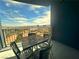 Inviting balcony with city views, ideal for outdoor dining and relaxation at 211 E Flamingo Rd # 1012, Las Vegas, NV 89169
