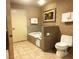 Clean bathroom featuring bathtub and toilet at 211 E Flamingo Rd # 1012, Las Vegas, NV 89169