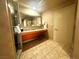 Spacious bathroom featuring dual sinks, large mirror, and walk-in shower at 211 E Flamingo Rd # 1012, Las Vegas, NV 89169