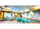 Serene indoor pool area with ample seating and natural light at 211 E Flamingo Rd # 1012, Las Vegas, NV 89169