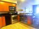 Well-equipped kitchen with stainless steel appliances and breakfast bar at 211 E Flamingo Rd # 1012, Las Vegas, NV 89169