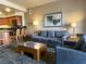 Comfortable living room with an open-concept design to the kitchen and calming colors at 211 E Flamingo Rd # 1012, Las Vegas, NV 89169