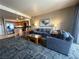 Comfortable living room with an open-concept design to the kitchen and calming colors at 211 E Flamingo Rd # 1012, Las Vegas, NV 89169