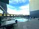 Inviting rooftop pool with ample seating, offering stunning city views at 211 E Flamingo Rd # 1012, Las Vegas, NV 89169