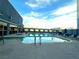Relaxing rooftop pool with comfortable lounge chairs and expansive city views at 211 E Flamingo Rd # 1012, Las Vegas, NV 89169