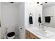 Clean bathroom with vanity, sink, and toilet with a black seat at 2219 Rugged Mesa Dr, Laughlin, NV 89029